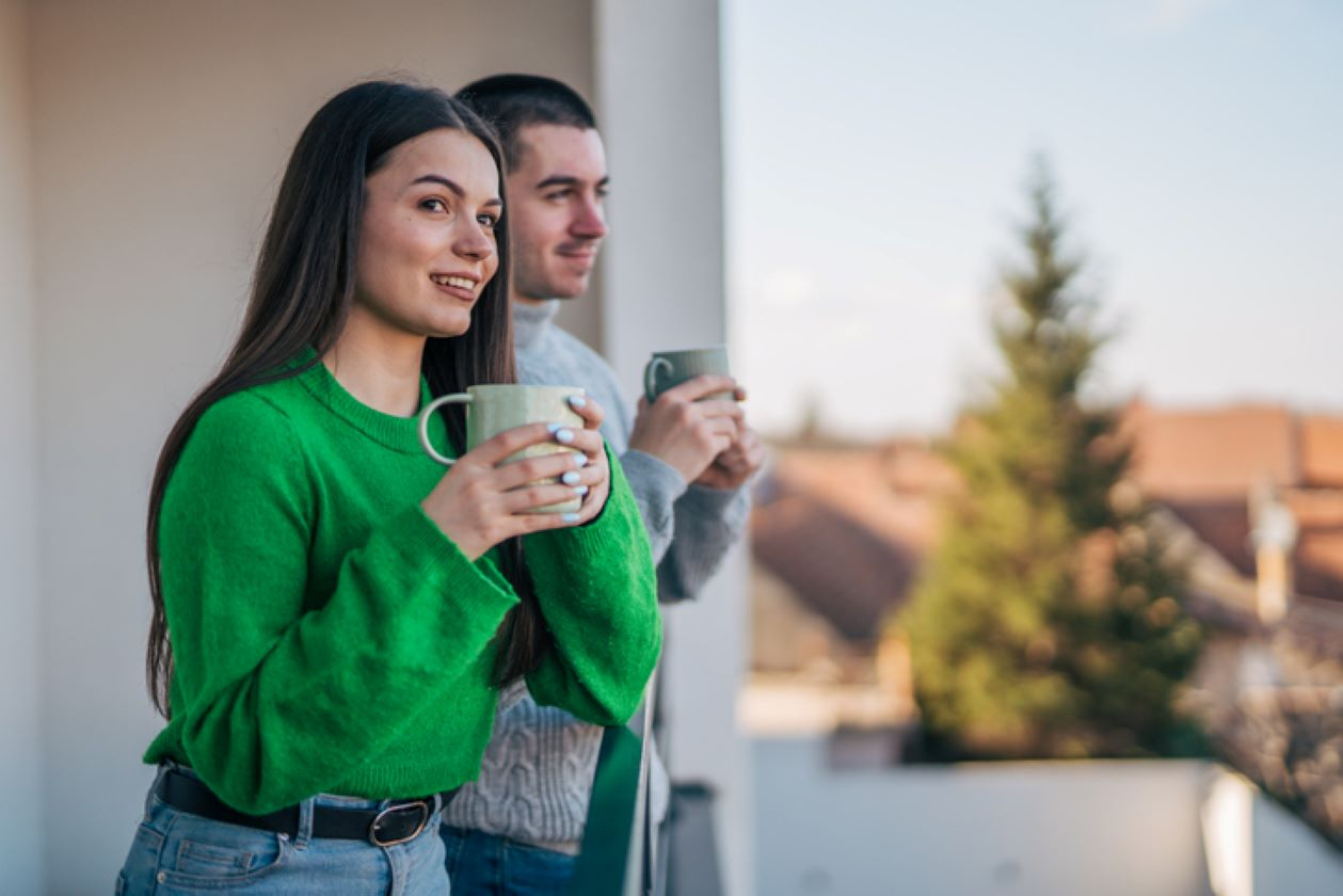 Couple reviewing mortgage paperwork with a lender