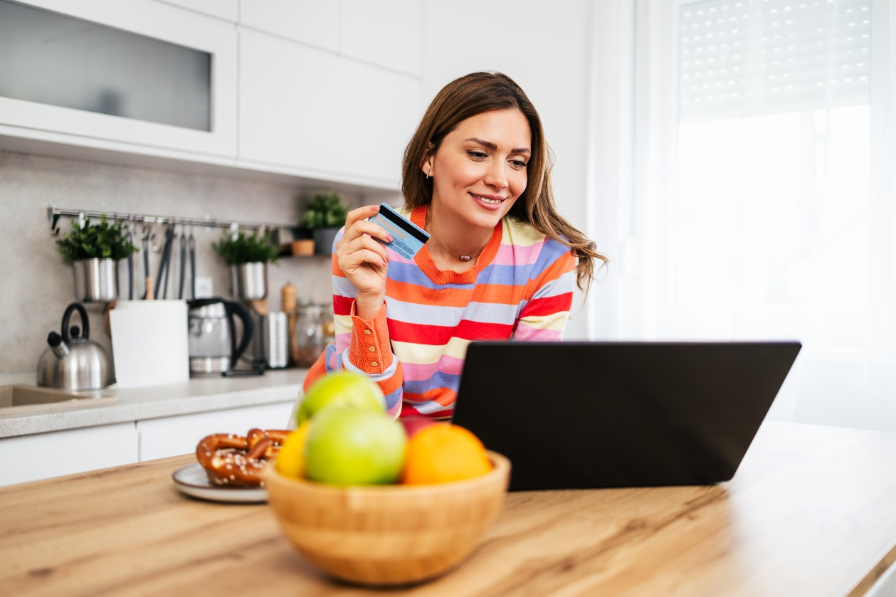 Sky mobile banking on phone and tablet showing accounts and card activity.